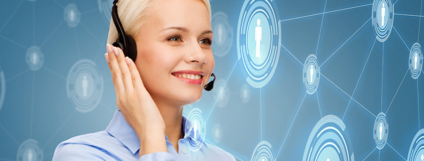 business, technology and call center concept - friendly female helpline operator with headphones